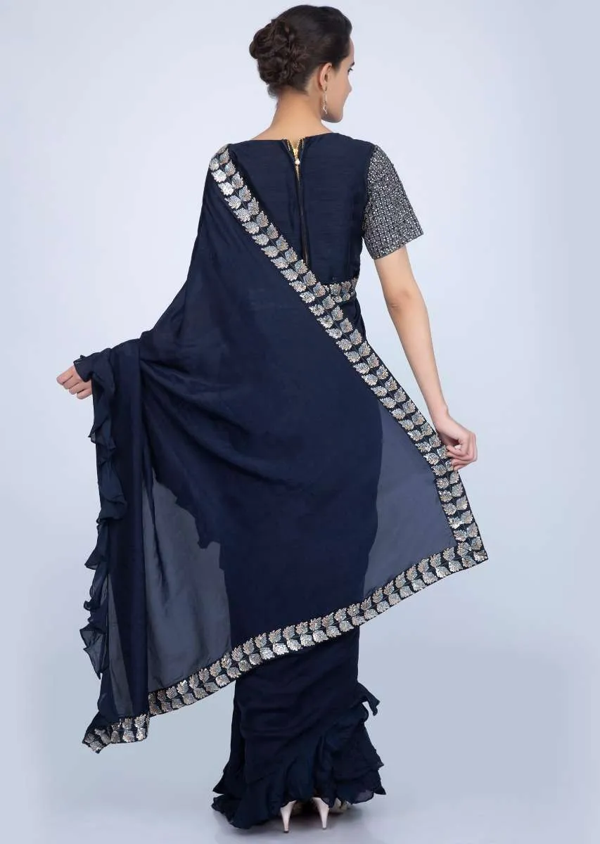 Navy blue silk saree with ruffled hem and pallo only on Kalki